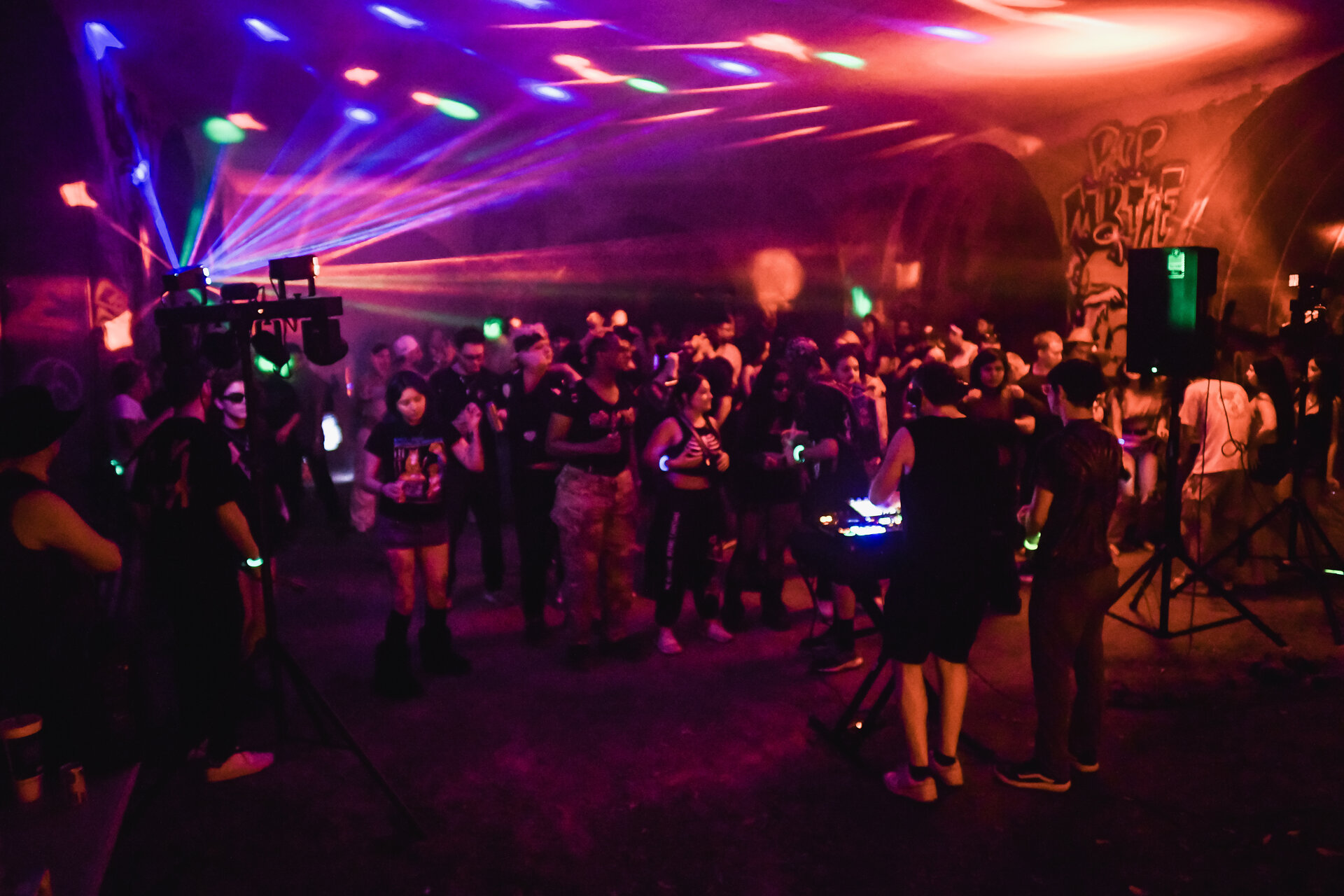 Underground event crowd with laser lights